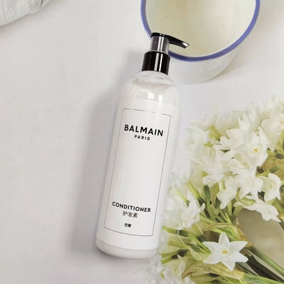 one bottle of balmain conditioner.